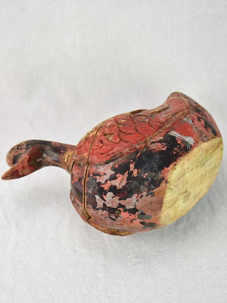 Antique French carved wooden sculpture of a duck with red patina - 1930's