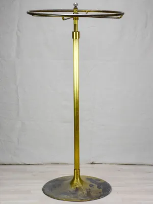 Antique French clothes rack display from a boutique - brass