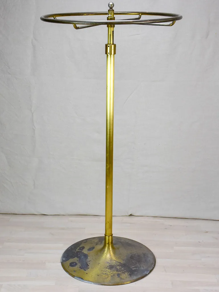 Antique French clothes rack display from a boutique - brass
