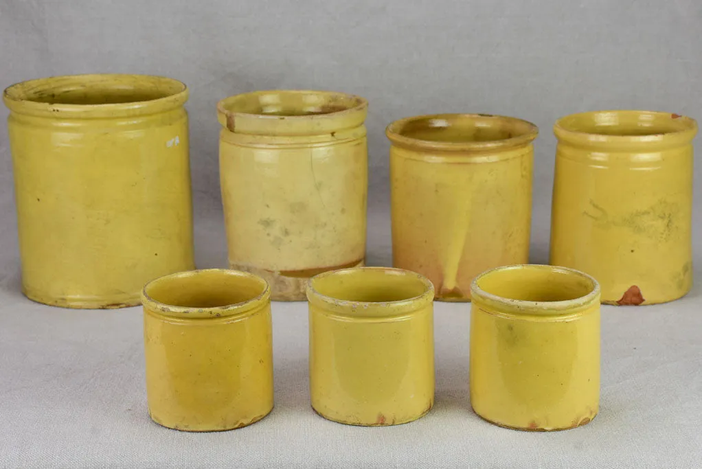 Collection of 7 antique French yellow ware preserving pots