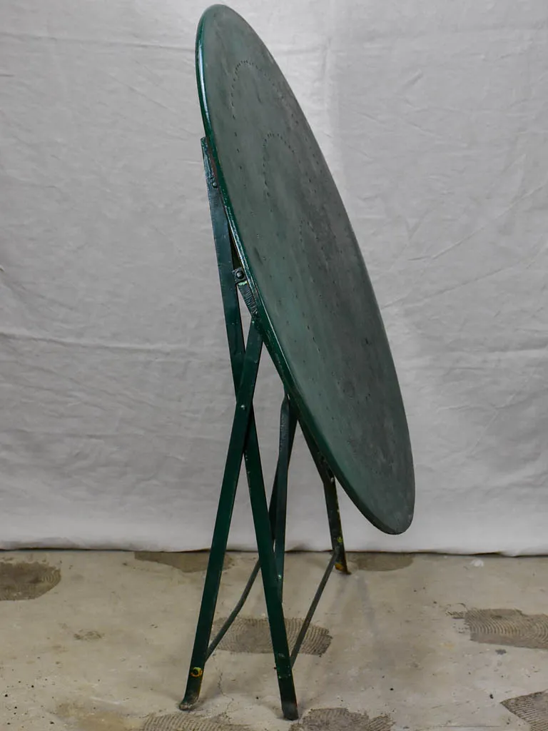 Round antique French folding garden table with green paint finish