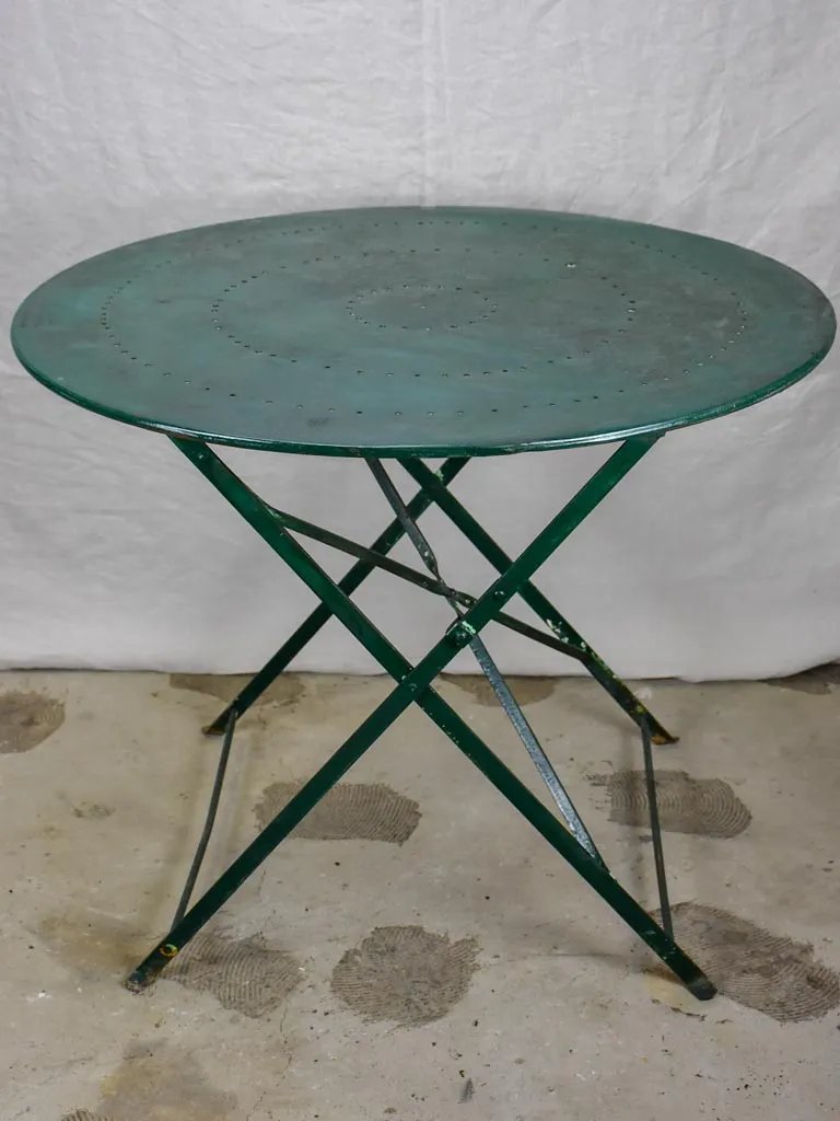 Round antique French folding garden table with green paint finish