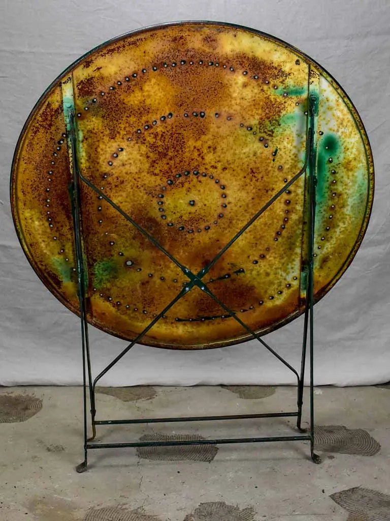 Round antique French folding garden table with green paint finish