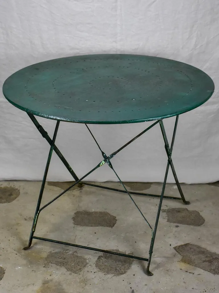 Round antique French folding garden table with green paint finish