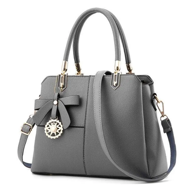 Three Color Combo Faux-Leather Tote Shoulder Bag with a Solar Symbol Tassel