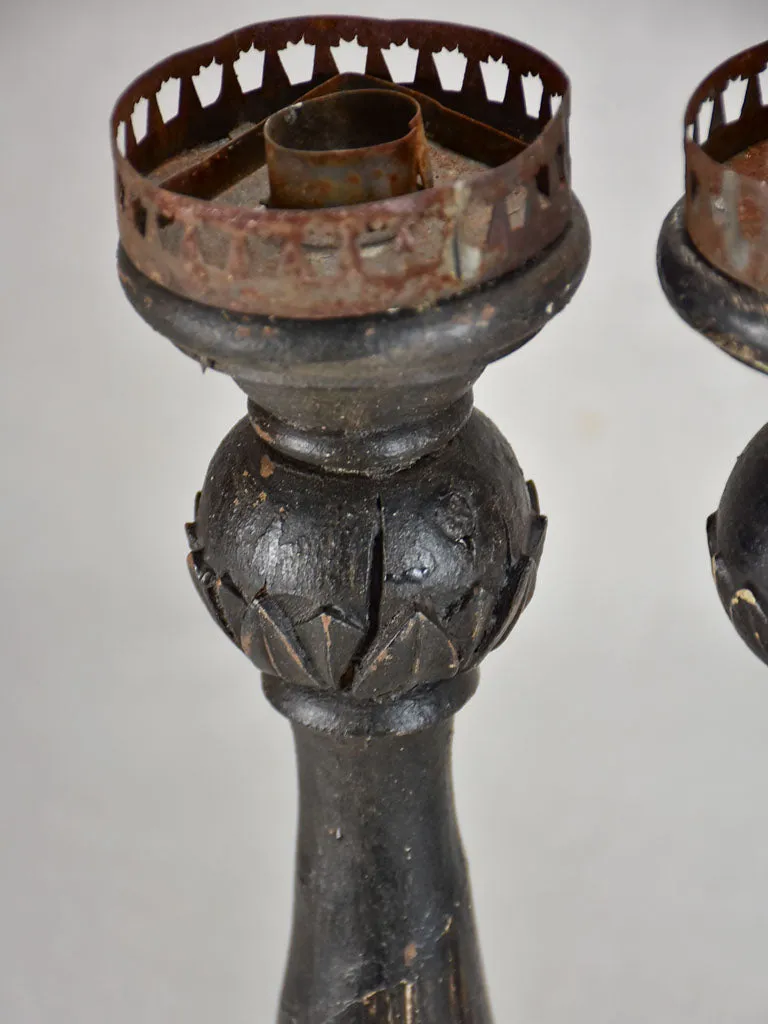 Three twentieth-century French wooden candlesticks with black paint finish 15"